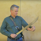 Illustration for article titled Pray as you watch this saber-wielding man use his body as a chopping blockem/em